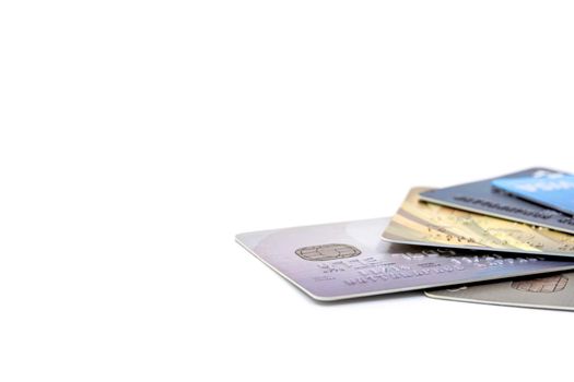 Selective focus of group of bank credit cards on white background.