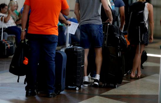 salvador, bahia/brazil - July 27, 2018: Queue of passengers at airline check-in at Salvador Airport.
