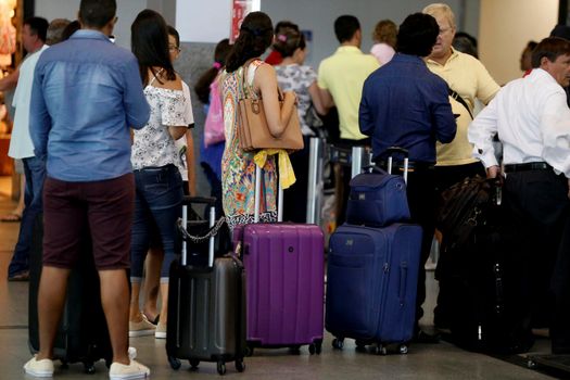 salvador, bahia/brazil - July 27, 2018: Queue of passengers at airline check-in at Salvador Airport.
