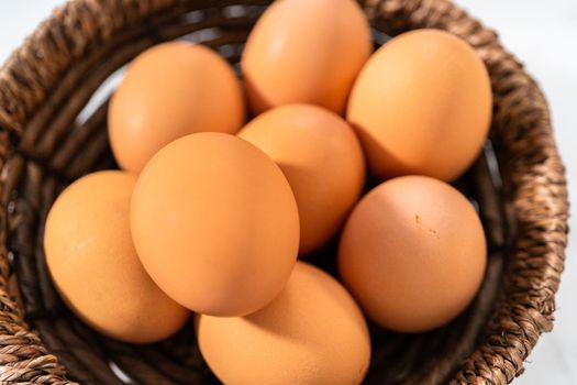 Measured ingredients in glass mixing bowls to make no-peel hard-boiled eggs.