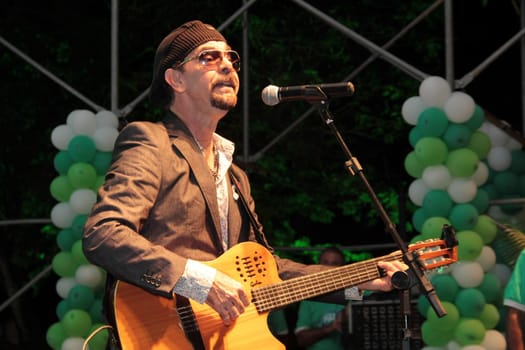 salvador, bahia, brazil - december 19, 2012: Singer and composer Nando Cordel, during a performance in the city of Salvador.