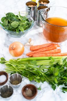 Ingredients to cook vegetarian white bean soup.