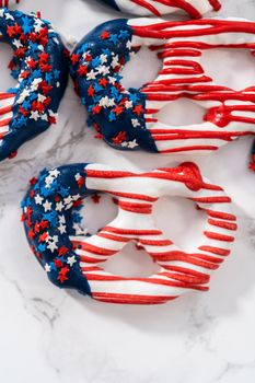 American flag. Red, white, and blue chocolate-covered pretzel twists.