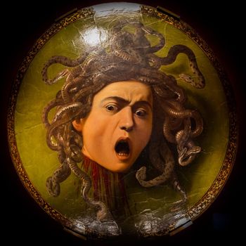 Florence, Italy - Circa August 2021: Medusa by Caravaggio, ca 1598 - oil on canvas