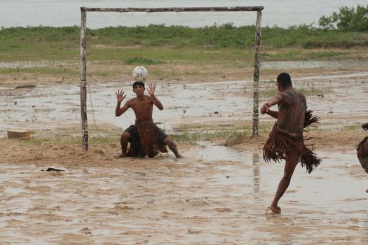 santa cruz cabralia, bahia / brazil - april 21, 2009: Ethnic Pataxo Indians are seen at a soccer match at Coroa Vermelha Village during the IX Edition of the Indian Games.