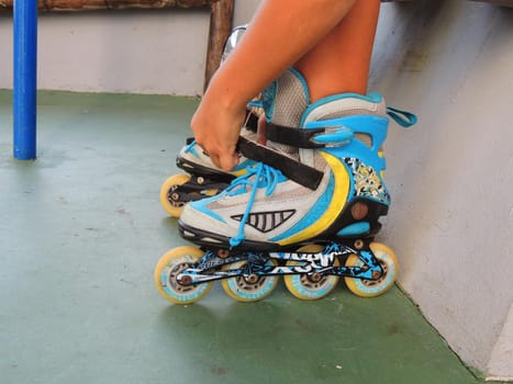 salvador, bahia, brazil - november 11, 2021: person wearing skates with wheels in a condominium in the city of Salvador.
