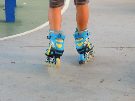 salvador, bahia, brazil - november 11, 2021: person wearing skates with wheels in a condominium in the city of Salvador.
