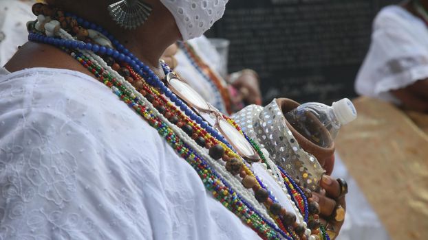 salvador, bahia, brazil - november 20, 2021: Candomble members and black entities participate in washing the statue of black leader Zumbi dos Palmares in the Historic Center of the city of Salvador.