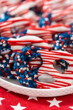 American flag. Red, white, and blue chocolate-covered pretzel twists.