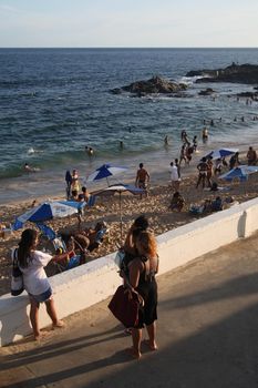 salvador, bahia, brazil - february 5, 2022: people on Barra beach in Salvador city.