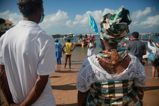 salvador, bahia, brazil - february 2, 2022: Candomble devotees and supporters of the African matriaz religion pay tribute to the orixa Yemanja in the city of Salvador.