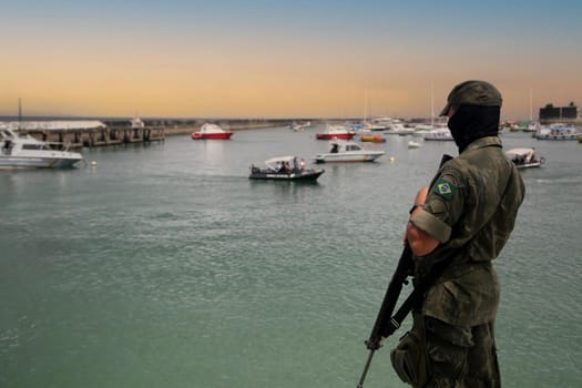 salvador, bahia, brazil - january 1, 2022: Brazilian Navy soldier makes surveillance in military area at barracks in Salvador city.