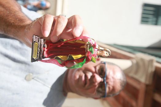 salvador, bahia, brazil - december 13, 2021: Faithful celebrate Santa Luzia day - Patron of ophthalmologists and protector of vision - in the city of Salvador