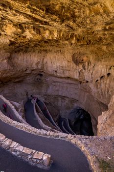 Switchback footpath winds into natural opening of Carlsbad Caverns.