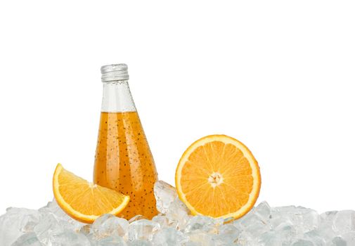 Close up one glass bottle of cold orange juice cocktail drink with chia seeds and half cut orange on ice cubes isolated on white background, low angle side view