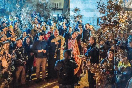 Montenegro, Budva 7.01. 2021: Christian Christmas in Montenegro, the feast of the oak branch. People burn an oak branch in honor of Christmas.