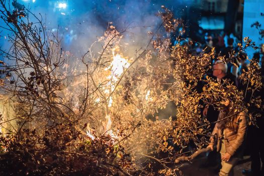 Montenegro, Budva 7.01. 2021: Christian Christmas in Montenegro, the feast of the oak branch. People burn an oak branch in honor of Christmas.