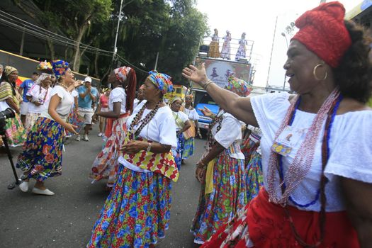 salvador, bahia / brazil - february 24, 2017: Members of The Itapua Ganhadeiras Cultural Group are seen during presentation at the Carnival in the city of Salvador.