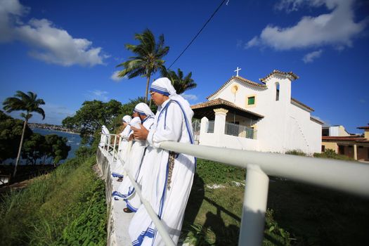 salvador, bahia, brazil - december 12, 2016: Missionaries of Caridades are seen from the church of Nossa Senhora da Escada in the Escada neighborhood in the city of Salvador.