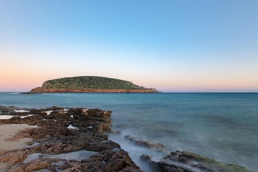 Ibiza sunshine from Cala Conta Comte in San Jose at Balearic Islands Spain.