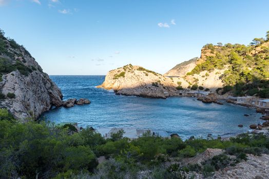 Turquoise waters in Es Portitxol, Ibiza, Spain. Hidden bay on the Island of Ibiza, in Sant Joan de Labritja.