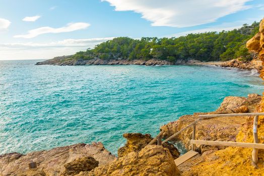 Cala Salada and Saladeta in san Antonio Abad at Balearic Islands Spain. Typical house for fishing boats and rocks.