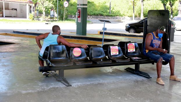 salvador, bahia, brazil - december 30, 2020: chairs are seen with an isolation mark at the bus station in the city of Salvador.