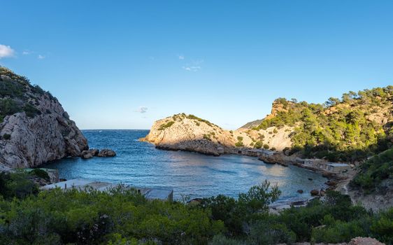 Turquoise waters in Es Portitxol, Ibiza, Spain. Hidden bay on the Island of Ibiza, in Sant Joan de Labritja.