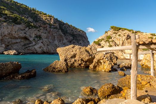 Turquoise waters in Es Portitxol, Ibiza, Spain. Hidden bay on the Island of Ibiza, in Sant Joan de Labritja.