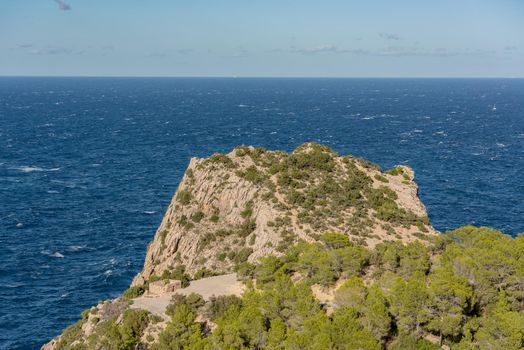 Turquoise waters in Es Portitxol, Ibiza, Spain. Hidden bay on the Island of Ibiza, in Sant Joan de Labritja.