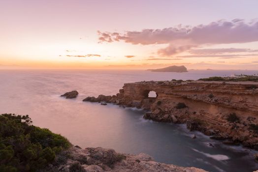 Ibiza sunset from Cala Conta Comte in San Jose at Balearic Islands Spain.