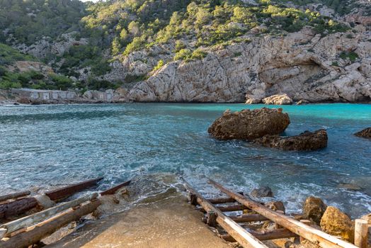 Turquoise waters in Es Portitxol, Ibiza, Spain. Hidden bay on the Island of Ibiza, in Sant Joan de Labritja.