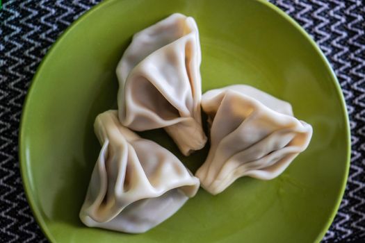 Traditional georgian dumplings known as khinkali served on the plate