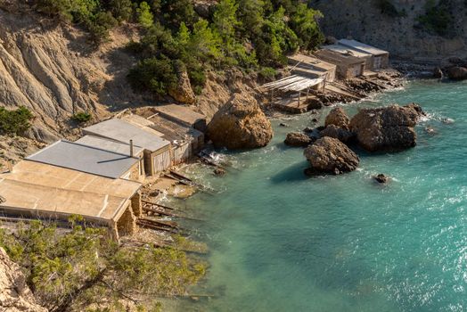 Turquoise waters in Es Portitxol, Ibiza, Spain. Hidden bay on the Island of Ibiza, in Sant Joan de Labritja.