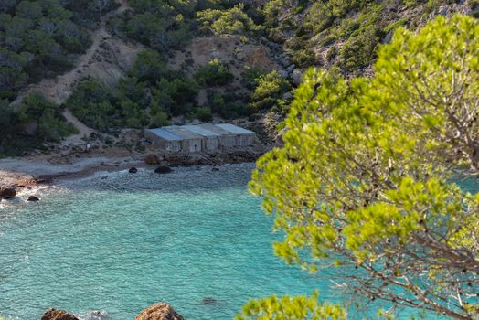 Turquoise waters in Es Portitxol, Ibiza, Spain. Hidden bay on the Island of Ibiza, in Sant Joan de Labritja.