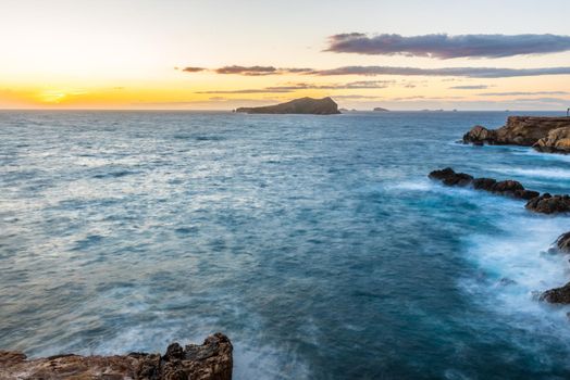 Ibiza sunset from Cala Conta Comte in San Jose at Balearic Islands Spain.