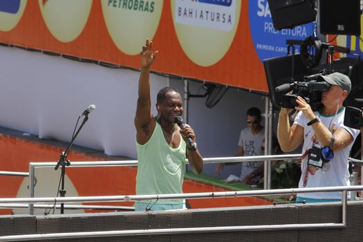 salvador, bahia, brazil - february 10, 2013: the singer Tatau from the band Araketu during a performance in the Carnival of the city of Salvador.