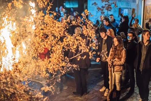 Montenegro, Budva 7.01. 2021: Christian Christmas in Montenegro, the feast of the oak branch. People burn an oak branch in honor of Christmas.