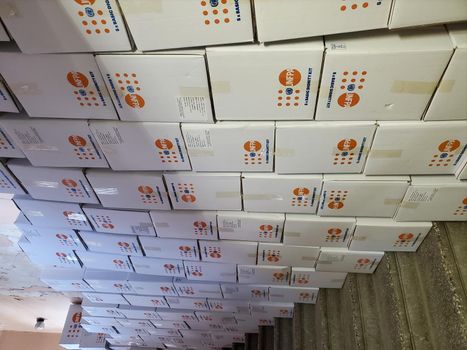 Boxes with humanitarian aid for temporary moved Ukrainian people on the warehouse. Dnipro, Ukraine - 06.30.2022