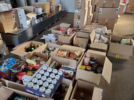 Food humanitarian aid for Ukraine sorted in parcels before send out to temponary moved persons. Dnipro, Ukraine - 06.30.2022