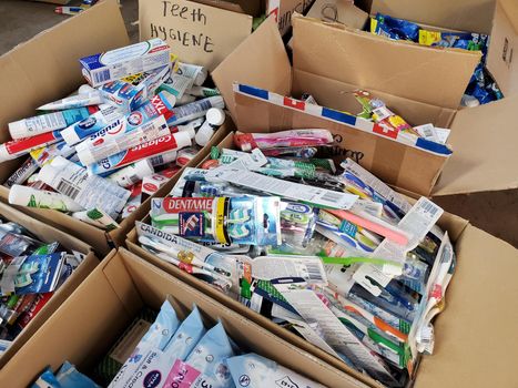 Food an hygiene humanitarian aid for Ukraine sorted in parcels before send out to temponary moved persons. Dnipro, Ukraine - 06.30.2022