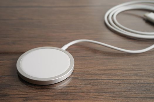 Wireless charger, magnetic charging modern equipment of mobile phone.