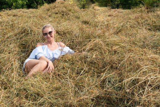 Travel happy fashion portrait girl sunglasses field hay haystack, from happiness nature in young and jacket slim, contemplation haymow. Full wild meadow,