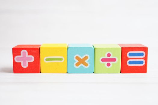 Number wood block cubes for learning Mathematic, education math concept.