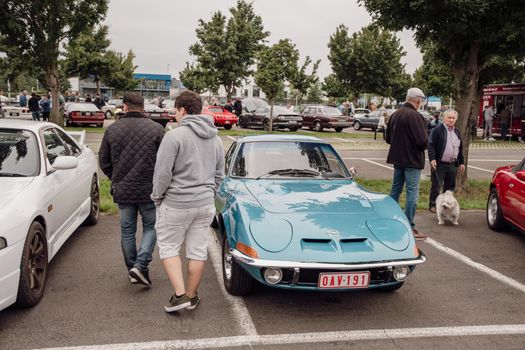 Genk, BELGIUM, August 18, 2021: classic summer meet of oldtimer at The Luminus Arena Genk, blue Opel GT 1975, High quality photo
