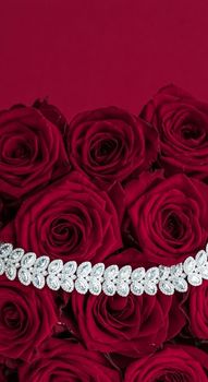 Luxe branding, glamour fashion and boutique shopping concept - Luxury diamond jewelry bracelet and red roses flowers, love gift on Valentines Day and jewellery brand holiday background design