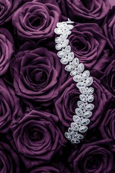 Luxe branding, glamour fashion and boutique shopping concept - Luxury diamond jewelry bracelet and purple roses flowers, love gift on Valentines Day and jewellery brand holiday background design