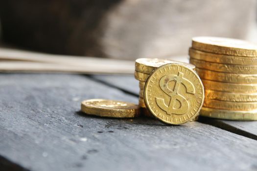 Stacks of gold coins on a vintage background. The concept of a successful business.