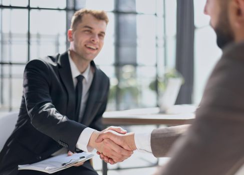 Business handshake and business people