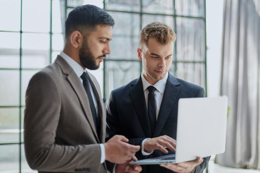 Businessman discussing project with colleague